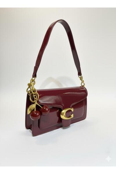 loş Women's patent leather C-shaped handbag with a cherry charm and a long external strap