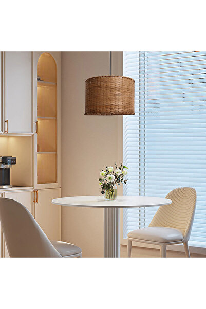 HAMER A 40cm rope chandelier adds a touch of nature to the space.