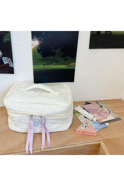 Generic A stylish padded cosmetic bag with a zipper closure, decorated with a floral pattern ribbon.
