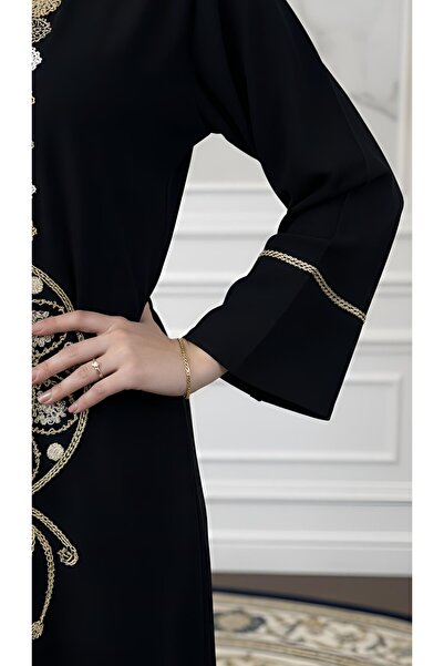 ISHRAQAT AL-AMAL Elegant dress with luxurious gold embroidery