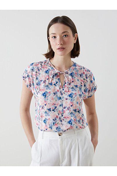 LC Waikiki بلوزة أزماركا الجديدة للموسم بياقة مربوطة ونقشة زهور