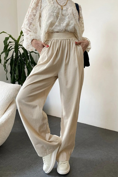 Lady Pixie بنطلون بالازو عالي الخصر من مزيج الكتان الطبيعي باللون البيج مع خص...