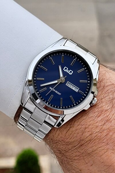 Q&Q Kadranı Lacivert Kordonu Silver Renk 24 Ay Garantili 40,5 mm Göstergeleri...