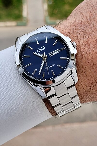 Q&Q Kadranı Lacivert Kordonu Gümüş Renk 40,5 mm İç Göstergeleri Aktif Erkek K...