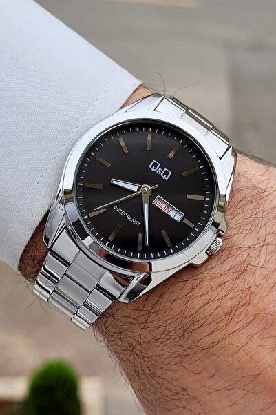 Q&Q Kadranı Siyah Kordonu Silver Renk 24 Ay Garantili 40,5 mm Göstergeleri Ak...