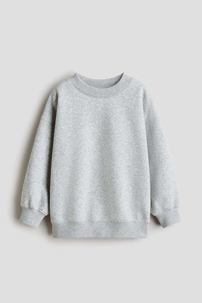 H&M بلوزة كبيرة الحجم برقبة دائرية