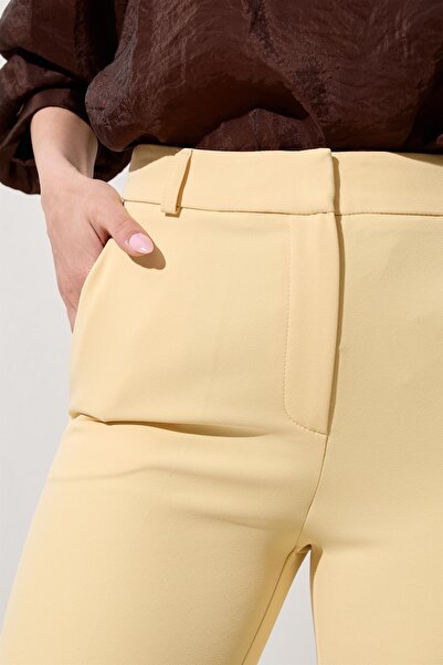 Setre Масляно-жовті штани з кишенями та деталями