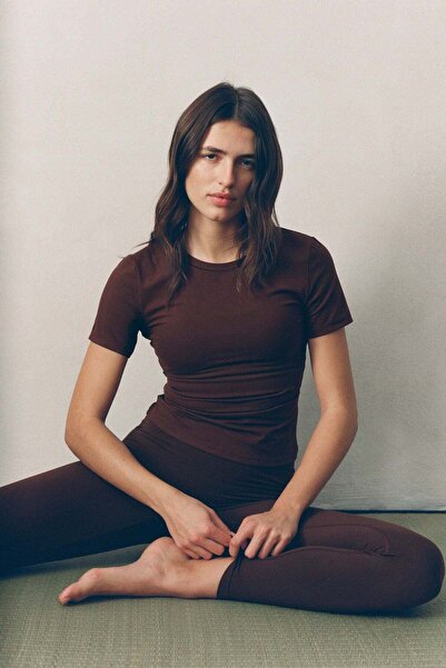 H&M قميص رياضي مع SoftMove™