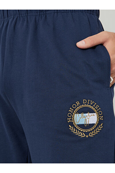 Styli Men Navy Blue Embroidered Terry Joggers