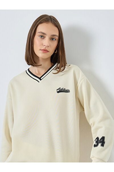 Styli Women Off White Varsity Sweatshirt
