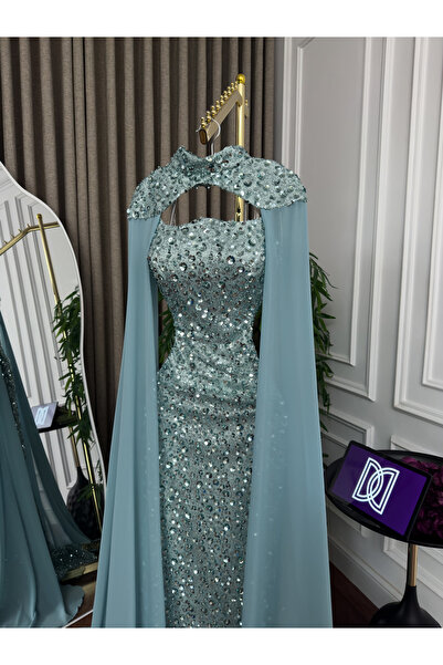Generic Luxurious evening gown with full beadwork - embroidered trim with a flowing chiffon cape - in a captivating Tiffany blue
