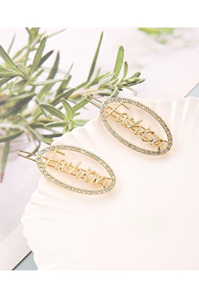 REBORN DESIGN مشبك جانبي معدني ذهبي اللون بتصميم بيضاوي أنيق مع تفاصيل حجر ال...