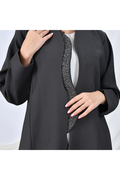 HAWRAA ABAYA Elegant abaya design combining simplicity and luxury, featuring a quarter-circle cut and embellished edges | Gray