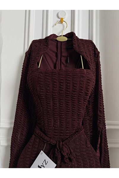 ABRARYZ A dress with a distinctive pattern, modest