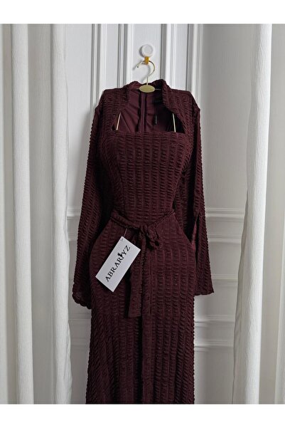 ABRARYZ A dress with a distinctive pattern, modest