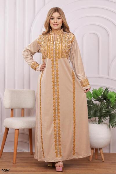 Lyaly aljlabyh A velvet winter jalabiya with elegant "shoulder and arm" embroidery, a modest and modern look.