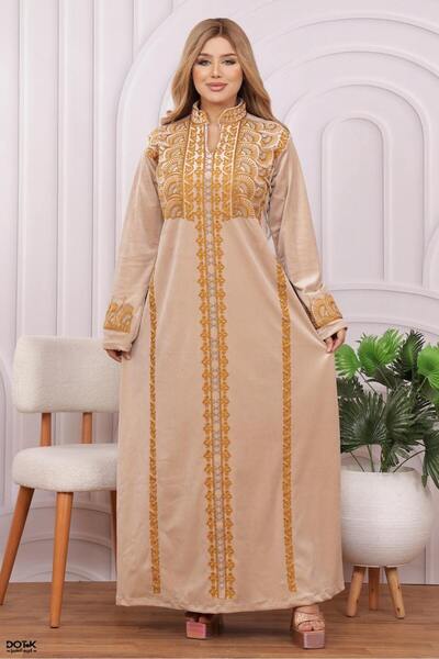 Lyaly aljlabyh A velvet winter jalabiya with elegant "shoulder and arm" embroidery, a modest and modern look.