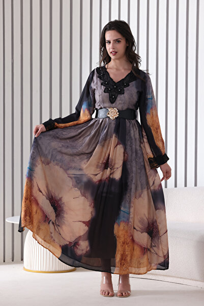 Verona Trading Company Silk maxi dress with a large pink print and artistic touches, featuring a decorative collar and embellished belt.