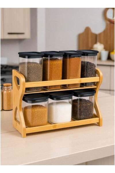 ALQANNAS 7-piece glass spice container, two-tiered, with a sturdy wooden stand.