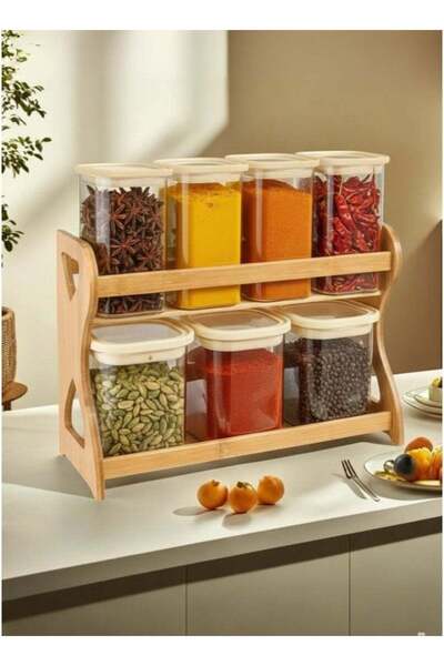 ALQANNAS 7-piece glass spice container, two-tiered, with a sturdy wooden stand.