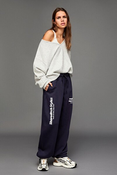 Bershka Baskılı jogger fit şardonlu eşofman altı