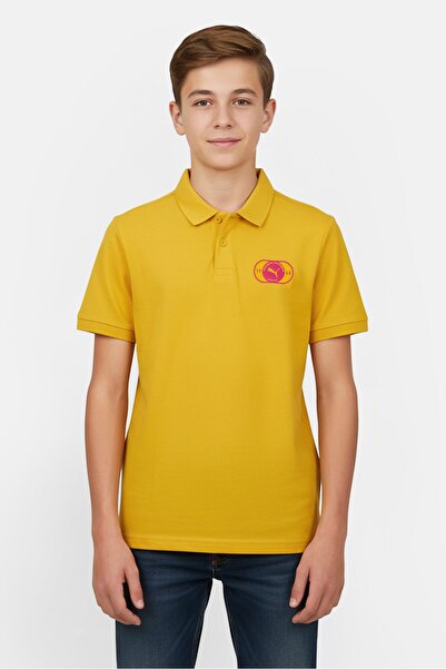 Puma قميص بولو رياضي للأولاد بأكمام قصيرة وشعار العلامة التجارية، باللون الأصفر
