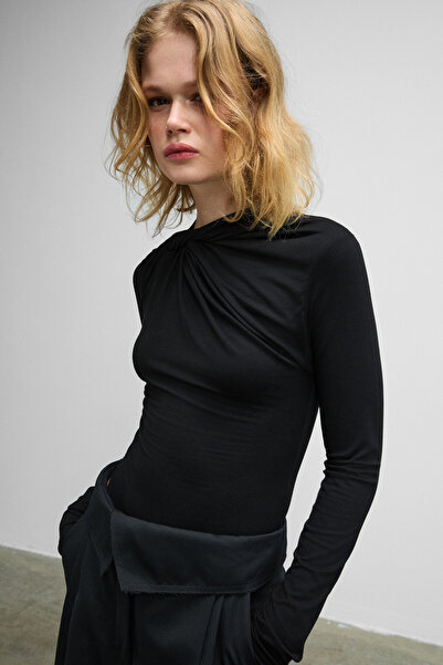 GRIMELANGE Haze Women's Round Neck Front Knot Detail Long Sleeve Bodycon Stretchy Fabric Snap Fastener Black Bodysuit