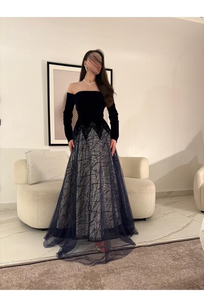 Thara A navy blue dress with sleeves, suitable for elegant evening wear.