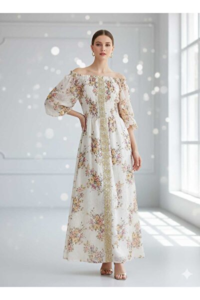 Generic A chiffon maxi dress with an off-shoulder cut and tuxedo gathering.