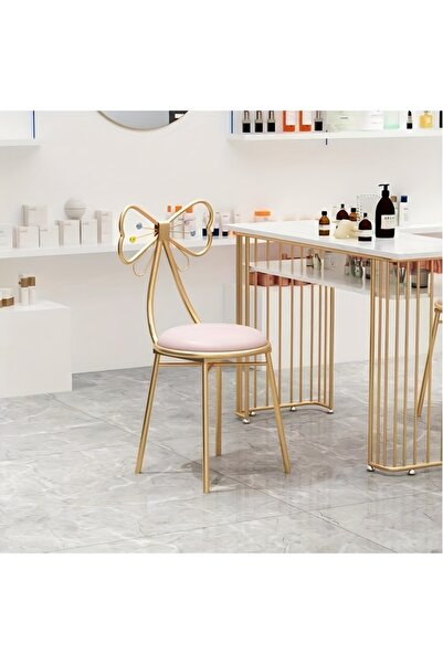 Generic A pink beauty chair with a backrest and luxurious,velvet cushions; a chair for a nail salon.