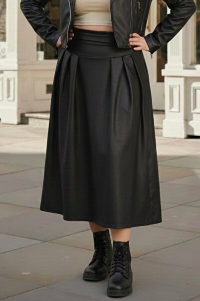 Chiccy Чорна тоненька спідниця з еластичним поясом, з боковими швами, з штучної шкіри, ткана, 84 75