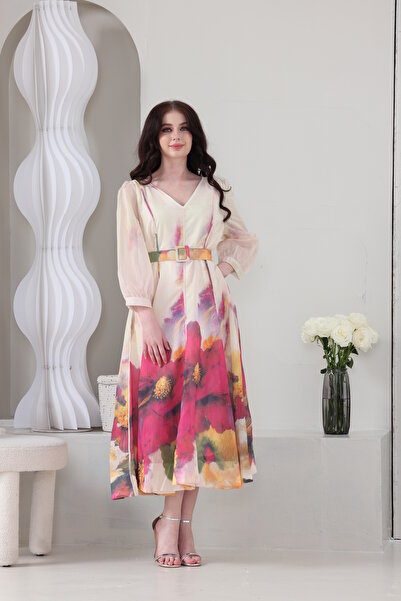 Verona Trading Company Chiffon midi dress with a large floral print and a matching belt.