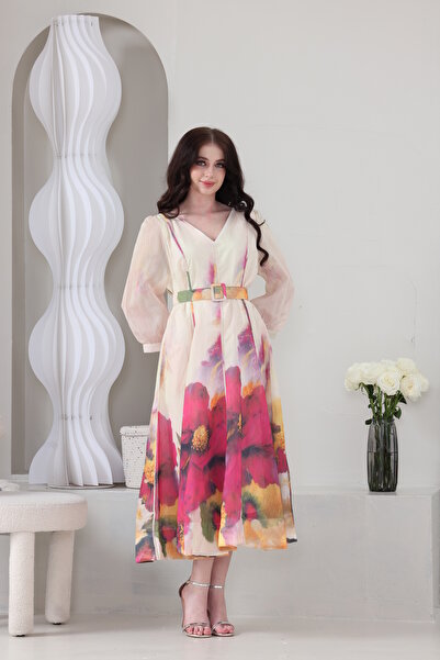 Verona Trading Company Chiffon midi dress with a large floral print and a matching belt.
