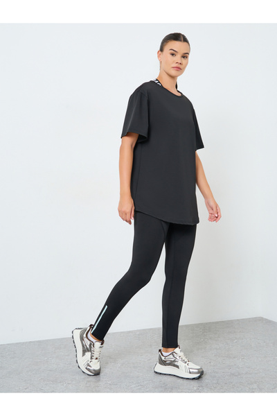 Styli Pack of 3 - Mesh Panel T-Shirt, Crossback Strap Sports Bra and Stitch Detail Leggings