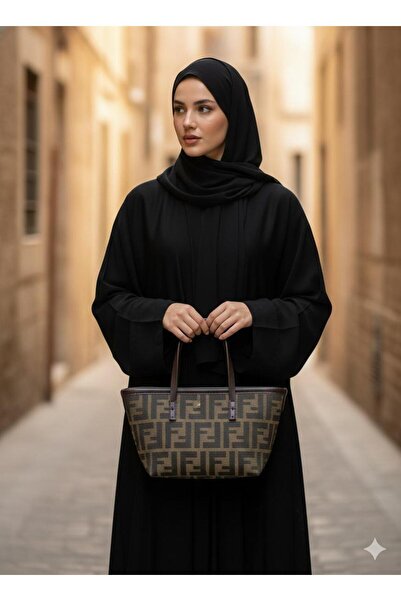 loş Women's leather handbag F, good material and details on all accessories with the letter F, and a long external strap.