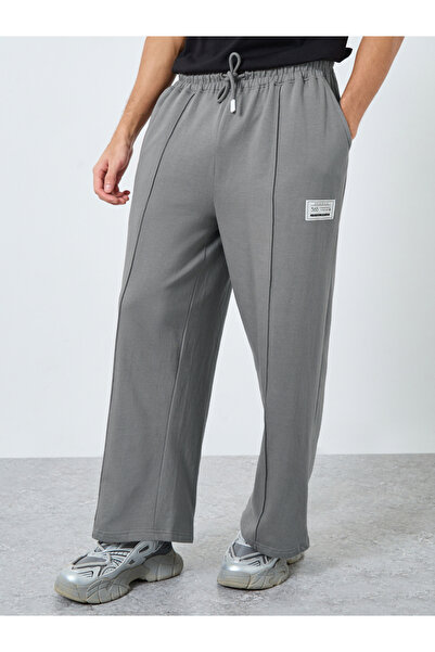 Styli Pintuck Wide Leg Terry Joggers with Badge Detail