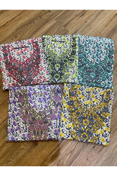 REHAM Emirati-style embroidered fabric, soft silk.