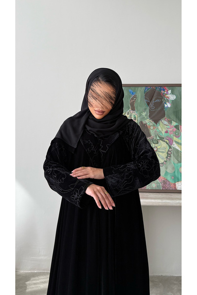 outline Black double-layered abaya with distinctive embroidery