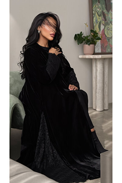 outline A black quarter-circle abaya with a blend of velvet and lace fabric.