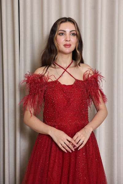 molan fashion A fiery red evening dress that steals the show from the first moment, for lovers of bold and luxurious looks.