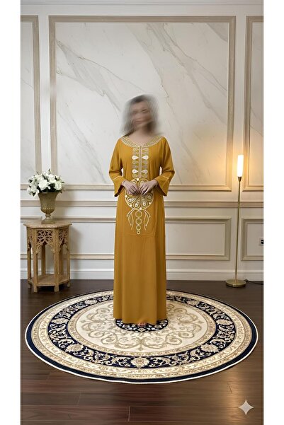ISHRAQAT AL-AMAL Elegant dress with luxurious gold embroidery