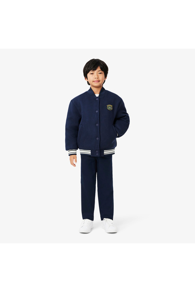 Lacoste بنطال من قماش الجبردين القطني المطاطي - HJ0939-00-166