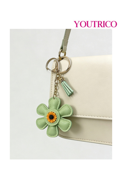 Youtrico قطعة واحدة من حقيبة جلدية مصنوعة يدويًا على شكل عباد الشمس وسلسلة مفاتيح على شكل كرتون لطيف
