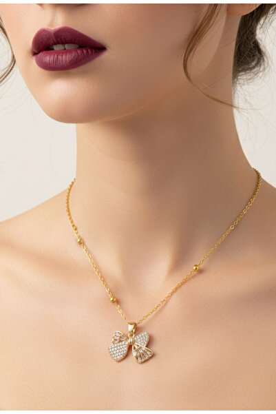 stainless steell gold renk beyaz taş baget fiyonk model top zincir çelik kolye