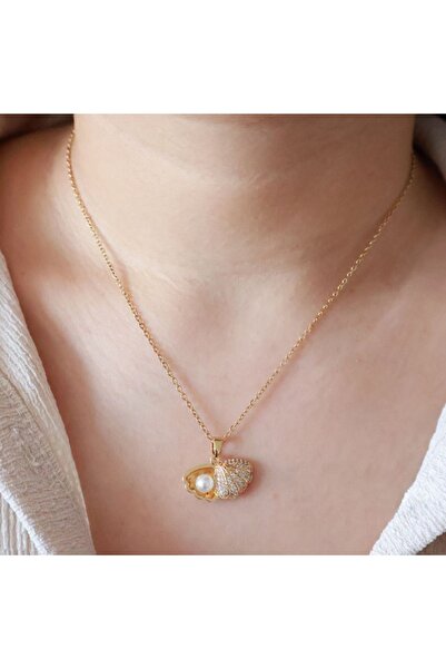 stainless steell gold renk deniz kabuğu inci detaylı minimal zirkon taşlı pas...