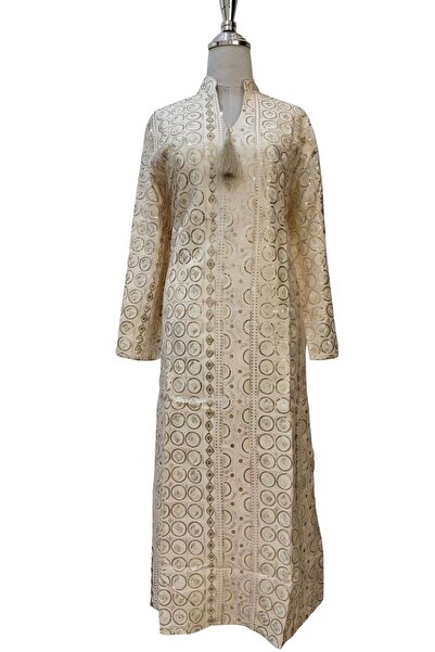 ISHRAQAT AL-AMAL A kaftan or jalabiya fully embroidered with gold circles