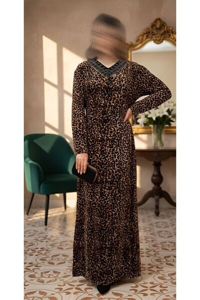 ISHRAQAT AL-AMAL A velvet dress with a leopard print, embroidered neckline, a...