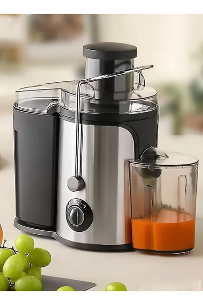 TOSCANA U Electric fruit and vegetable juicer with 800 watts of power and a 600 ml capacity, featuring a wide opening for juicing fruits and vegetables.