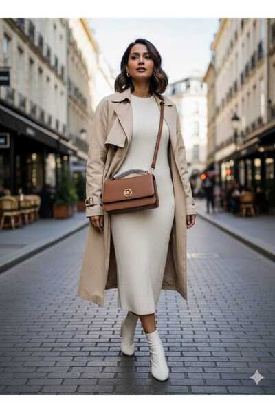 Generic A brown shoulder bag with a classic design, adding a touch of luxury to an elegant formal look.