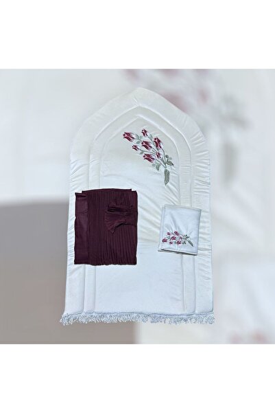 FABRIC A white rug with beautiful burgundy embroidery, along with a burgundy ...